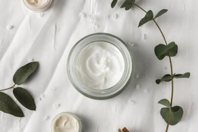 top view cream container with plant